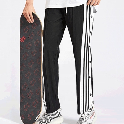 satın al Nefes Alıcı Erkek Özel Sokak Hip Hop Skateboard Track Pantolonları Yan Şerit ve Düğmelerle online manufacture