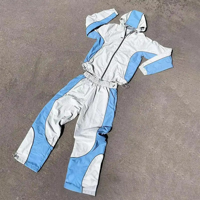 satın al Özel süslü süsleme fermuarlı ceket koşucu setleri renk bloğu naylon ter pantolonlar rüzgar kırağı spor takım elbise erkekler için online manufacture